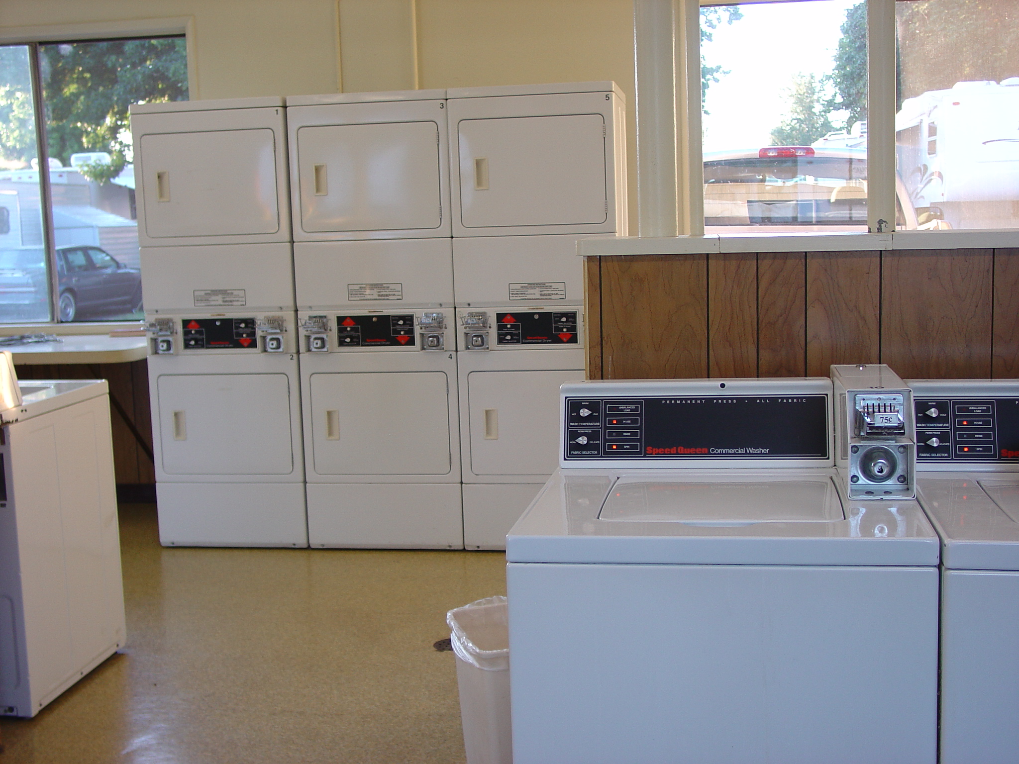 Laundry room with washers at Shamrock RV Village